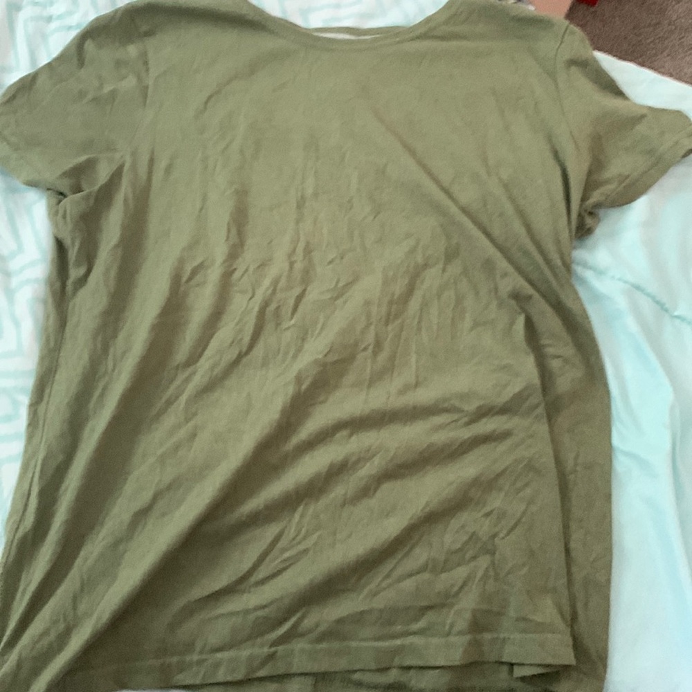 The color is green size is an extra large and in good condition